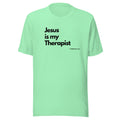 Light green t-shirt with the text 'Jesus is my Therapist' and reference to I Timothy 2:5.